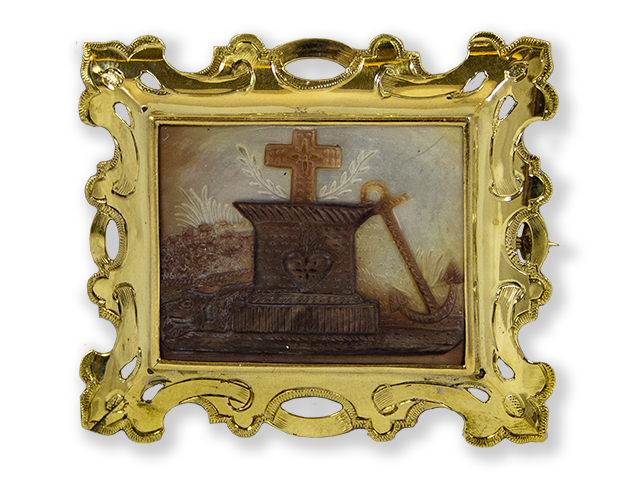 Carved mother of pearl plaque: Love, Faith, Hope. Set in gold engraved open worked brooch front
