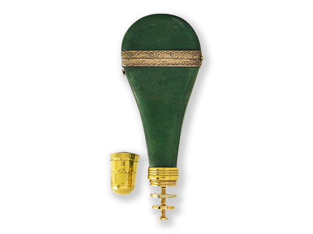Balloon shaped chagrin sewing necessaire with 8-piece gilt metal items.
